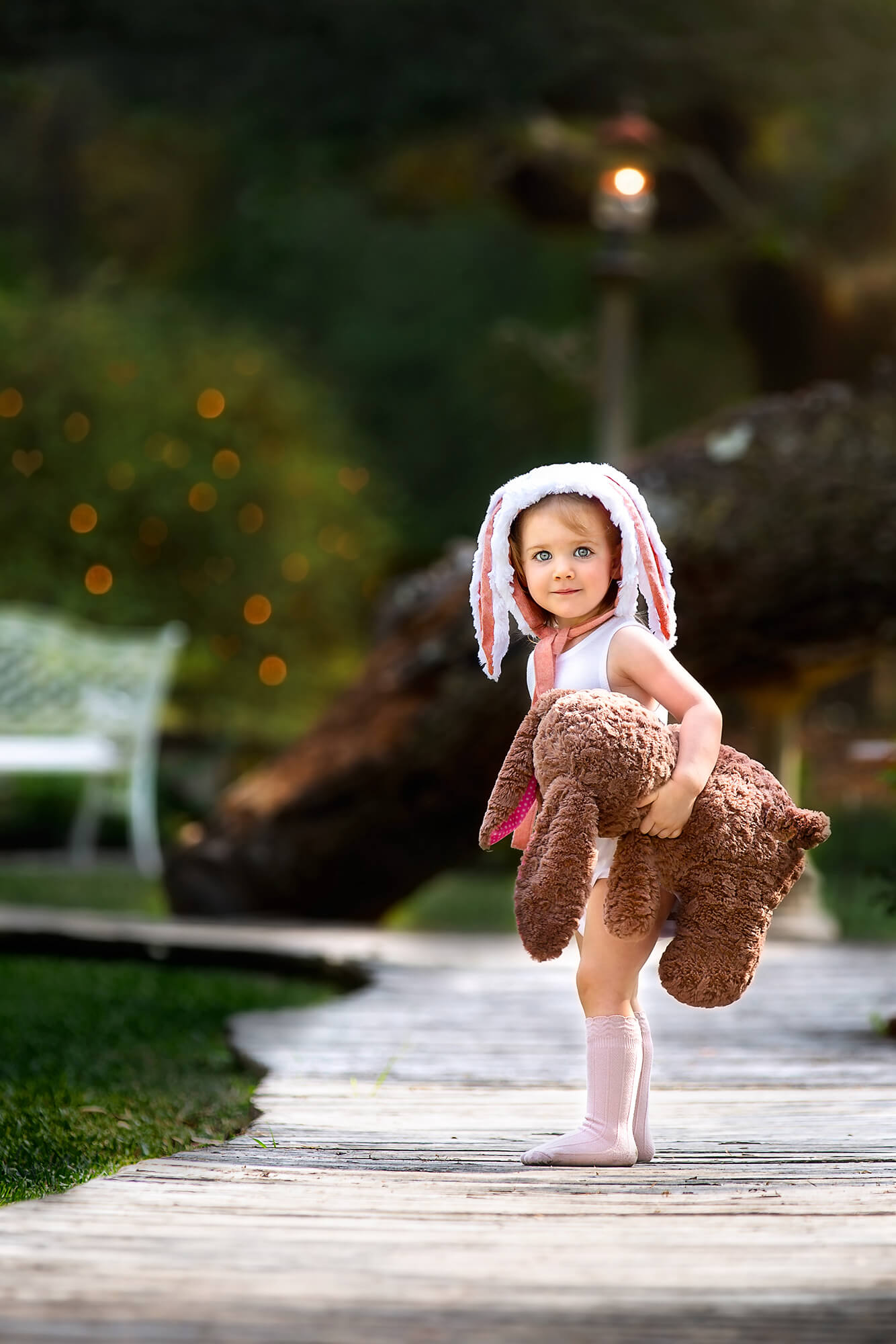 Toddler girl holding her favorite teddy bear in Houston