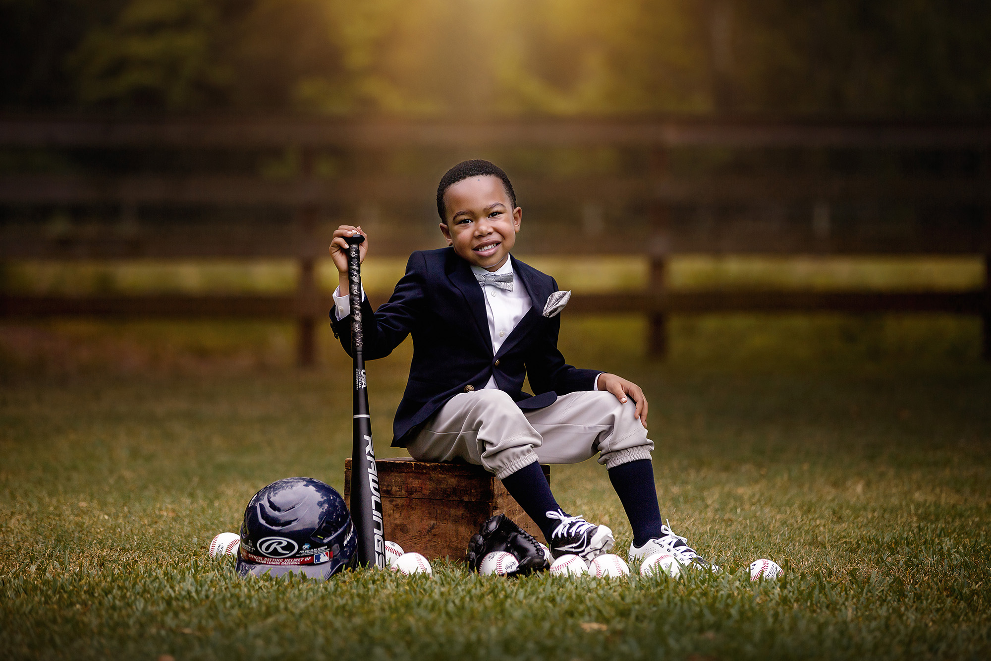 Adorable and stylish little boy with his baseball gear ready to go to one of the indoor playgrounds in Houston, Texas.